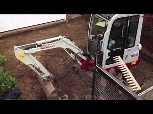 Loading A MAN Tipper With A Takeuchi Mini Excavator