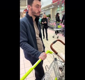 Man absentmindedly moves the cart while baby waits in the stroller