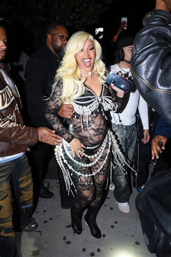 Cardi B Shows Off Her Baby Bump in a Lace Catsuit Covered in Curtains of Pearls