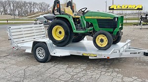 The Aluma 8214H-S-EL-BT-RTD (bi-fold tailgate) has a 5200# rubber torsion axle, 15" aluminum wheels, Electric Brakes, removable aluminum fenders, front retaining rail, fender steps, tongue handle, receptacle holder, LED lighting and a 80" X 172.5" bed size. https://alumaklm.com/products/utility/single-heavy-axle/8214hs-trailer/ https://alumaklm.com/dealer-locator/ #AluminumTrailer #Madeintheusa #utilitytrailer #Alumalife #utvaddicts #traveltips #bifoldtailgate #aluma | Aluma Trailers