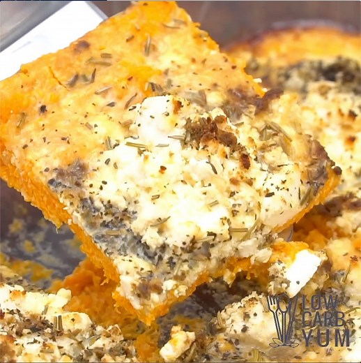 Savory pumpkin recipes like this pumpkin casserole are fantastic for a keto-friendly, holiday side dish. With its savory herb topping, the casserole will pair beautifully with a holiday turkey or ham. | Low Carb Yum