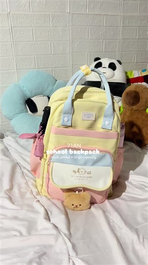 large capacity backpack💗 the color combination is so prettyyyy!💛🌸💙 #backpack #largecapacitybag #bagforstudent #spaciousbag #schoolbackpack