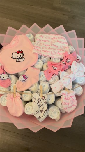Vivianbouquets ♡ on Instagram: "Hello kitty diaper bouquet - - - - #ramobuchon #smallbusiness #hellokittydiaperbouquet #diaperbouquet #babyshowergift #hellokitty"