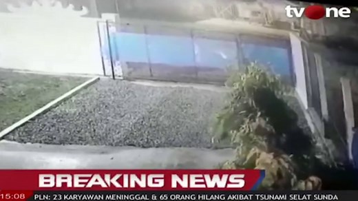 Horrifying moment person is swept away by Indonesia tsunami