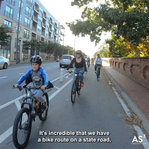 Propel ATL on Instagram: "Families are already riding safely on Memorial Drive’s new protected bike and scoot lane, and Propel ATL helped make it happen. In October, Jessica and her kids cut the ribbon on this two-way lane. We worked with the @gadeptoftrans, neighbors, and advocates to transform what used to feel like a “car sewer” into a space where everyone can move safely and confidently. 💛 Give before midnight on December 31 to make your 2025 donation tax-deductible and help us end the year