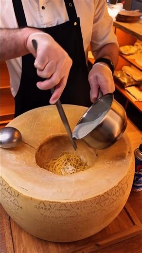 Pasta Cooked Inside a Giant Cheese Wheel