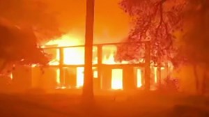 California's Eaton fire burns multiple homes as it doubles in size