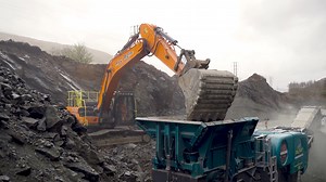 A giant machine crushing tons of rock