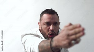 Man screaming. Angry and mad raising fist frustrated and furious while shouting with anger. Rage and aggressive concept. Screaming brutal guy. Face expression. Crazy man.