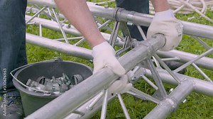 Event portable adjustable aluminium stage system installation Slow motion detail