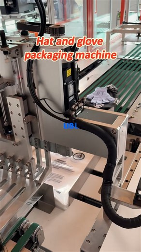 UBLpacking | This machine packages hats and gloves, automatically completing the packaging process, including sealing with adhesive tape and applying... | Instagram