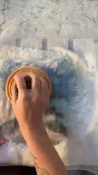 This was my first attempt at wet felting a landscape and finishing it with needle felted details