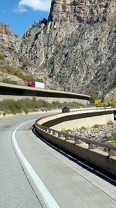 🍂🚗 Driving I-70 through the Colorado canyons in the fall is absolutely unforgettable. Golden, orange, and red colors covering the mountains, the river cutting through the valley, and the highway winding between massive canyon walls every turn looks like a postcard. If you love road trips nature fall colors, this stretch belongs on your bucket list. Who would take this drive today? #Colorado #I70 #FallColors #RoadTrip #Canyons Travel Nature Mountains | JeanTrip
