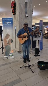 Bringing Caymanian vibes to Tampa International Airport today with Caymanian musicians and songwriter Staurt Wilson! #40YearsAtTPA #caymanairways #Tampa #flytpa | Cayman Airways Ltd.
