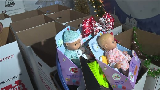 Kent Erdahl stops by Kare 11's Toys for Tots tent