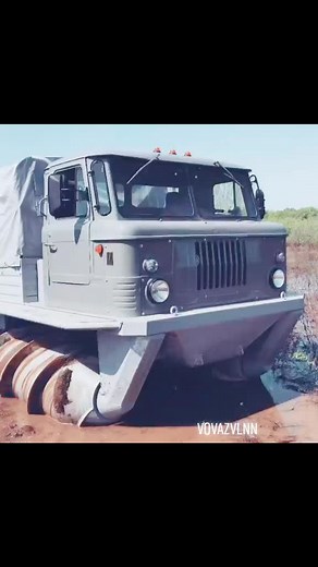 Military Vehicle Navigating Muddy Terrain