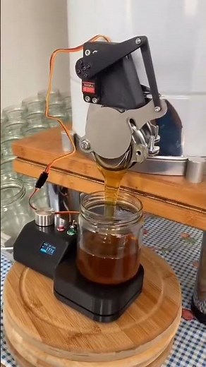 🍯🤖 Honey Bottling Perfection: Automated Filling Machine in Action 🐝✨