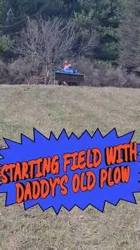 My daddy's two bottom plow breaking dirt for new hay field.