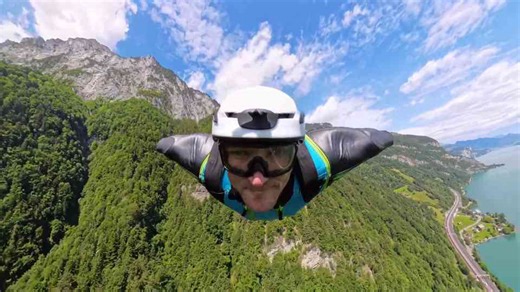 Man takes on a stunning Swiss wingsuit flight with a long approach