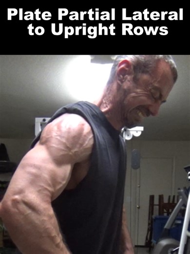 Plate Partial Laterals to Upright Rows... this is one I want to get some feedback on from you (coming to you from my garage this time!). Personally, I can't do normal upright rows with a barbell - it puts my shoulders in a really bad position. But I've always tried to come up with a good alternative that I CAN actually do. This one I think is a good one. I found it really hammered my lateral delts and traps (and even brachialis, to some degree). It uses a pair of plates with handles built into t