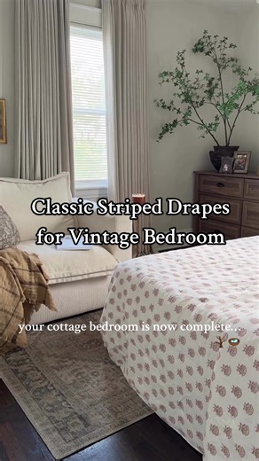 Classic Striped Drapes for Vintage Bedroom! These curtains are saving my sleep. Total blackout at night, but the stripes keep the bedroom looking so pretty. The fabric feels so high quality and they bring the perfect coziness to our space, without compromising a good night’s rest. 😴 pre-washed fabric guarantees a luxurious hang and a soft touch that is both pet-friendly and sophisticated. cr.@nuri.josephhome Product: Zaria Delicate Striped Pattern Pleated Drape Color: Milk Tea Header: Triple Fr