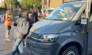 Moment van driver attempts to RUN OVER Insulate Britain protesters