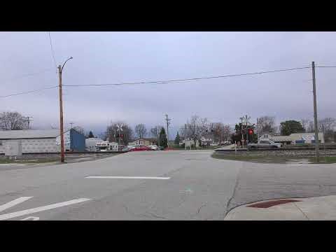 Main Street Railroad Crossing - CSX P051/AMTK 51 with AMTK 304 (Phase VI) in Chalmers, Indiana