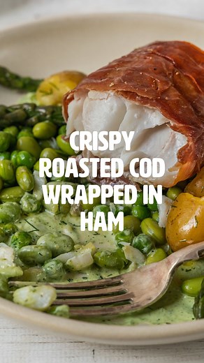 Crispy Roasted Cod Wrapped in Ham This mouthwatering dish combines succulent cod fillets with savory ham, creating a crispy and flavorful delight. Air Fryer - Serves 2 – Easy – Dinner, Lunch, Main Course Ingredients 200g baby new potatoes 2 Cod fillets 4 slices parma or serrano ham 200g baby new potatoes 100g Asparagus tips 150g Shelled Edamame Handful of peas 85g 1 tbsp dill Oil, salt and pepper, as needed Dressing Small handful of basil 40g Mayo 60g plain yogurt 1 tbsp dill Instructions 1. Par