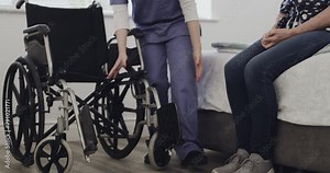 Caregiver, support or wheelchair for elderly woman in nursing home and healthcare for osteoporosis patient. Young nurse, senior lady or helping hand, disability help or orthopaedic care for injury