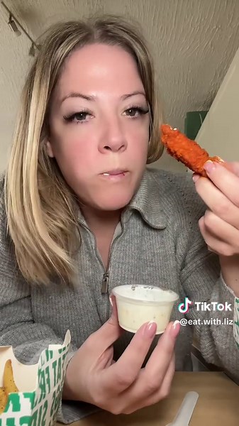 Enjoying Delicious Wings at Wingstop UK