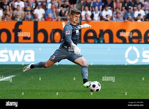 Augsburg, Germany. 19th Aug, 2023. Soccer: Bundesliga, FC Augsburg - Borussia Mönchengladbach, Matchday 1, WWK Arena. Goalkeeper Finn Dahmen of Augsburg plays the ball. Credit: Matthias Balk/dpa - IMPORTANT NOTE: In accordance with the requirements of the DFL Deutsche Fußball Liga and the DFB Deutscher Fußball-Bund, it is prohibited to use or have used photographs taken in the stadium and/or of the match in the form of sequence pictures and/or video-like photo series./dpa/Alamy Live News Stock P