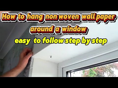 Pro decorator shows how he hangs Wallpaper around Windows