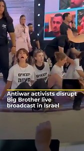 Watch the moment a group of Israeli activists stormed a live television broadcast to protest Israel’s war on Gaza. Members of Standing Together, wearing 'Leave Gaza' T-shirts, jumped onto the stage during the airing of the Big Brother show on Channel 13. | Al Jazeera English