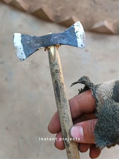 Creating a Double Axe from Old Rusty Bearings