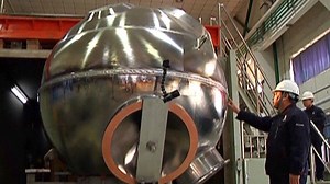 China is getting a step closer to exploring the bottom of the Mariana Trench, the largest crack in the Earth's surface, after the welding of the spherical shell of the submersible's capsule was completed on Saturday. For more: https://news.cgtn.com/news/3d3d514f79557a4d31457a6333566d54/share_p.html | CGTN