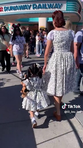 Chasing adventure at Disneyland on Twinning Tuesday! ✨ My daughter and I were racing to the Mickey and Minnie Runaway Railway ride, both wearing our 'Queen of the Forest' fabric dresses—me in the Razzle Dazzle and her in the Gianna. 🦌💚 Vintage-inspired fun for the whole family! Want to rock these looks too? Shop both the Razzle Dazzle and Gianna dresses on my website. #pinupstyle #rockabillystyle #1950sstyle #latinasmallbusiness #1950s #1950sfashion #dapperday2025 #disneyinspired #vintagelifes