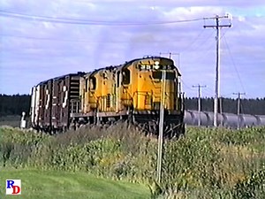 While the focus of railfanning was on Canadian Pacific's fleet of MLW power, videographer Tim Wakeman also took some side trips, one being a brief visit to the Roberval and Saguenay Railway, where he caught a pair of ex LIRR C420s in charge of a freight. From the BKVP show "Montreal's Machines, Last Stand of the 251" https://rfd.video/MM251 | Railfan Depot