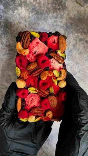 Chocolate with pieces of freeze-dried berries and crunchy nuts is not just a delicacy, but a real art that combines exquisite taste and useful properties ✨Each bar of this chocolate is a mix of sweetness, acidity and texture that will satisfy even the most demanding gourmet ❤️This chocolate will be a great gift option for your loved ones. It is suitable for both holidays and a simple token of attention. And you can learn how to make it yourself, just follow the link in the bio 🔥#chocolate#choco