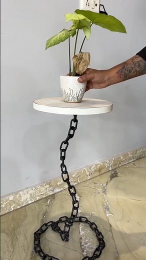 Introducing the Floating Chain Table a masterpiecethat defies gravity and blows minds #floatinghead