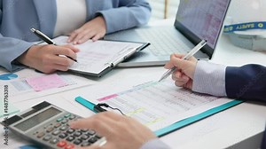 Expert woman asian female people review data number costing managerial account prepare monthly actual cost variance report income tax at audit office. ESG budget control ERP process service project.