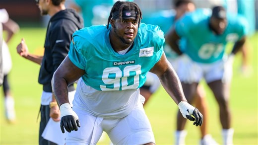 Dolphins rookie linemen Kenneth Grant, Jonah Savaiinaea struggling early