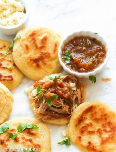 6K views · 342 reactions | Arepas are flat, fried corn cakes made...