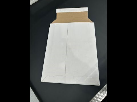 Box Plus 3 Corrugate Envelope machine with tear tape and silicone tape applications for E-commerce..