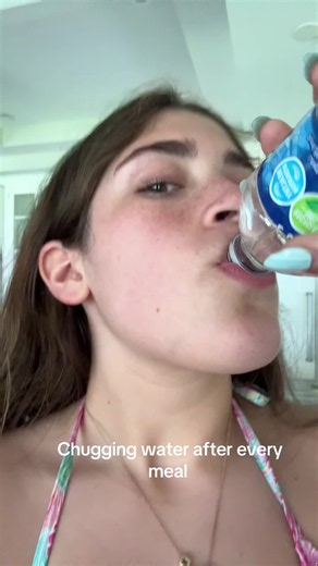 Cutting. | what does chugging water do after eating