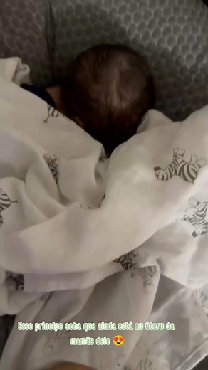 Have you noticed your newborn sleeping in this position? Newborns tend to fold themselves while sleeping due to the Moro reflex, an instinct from the fetal position, offering a sense of security. This curled posture not only reflects the womb's comfort but also conserves body heat, crucial for newborns with limited temperature control. It's an instinctual reflex and a practical way to stay warm during sleep. | We Love Babies