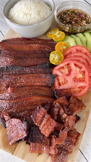 Filipino style grilled pork belly aka Inihaw na Liempo is typically grilled, but it can also be done in the air fryer. So convenient and clean up was a breeze! This recipe is truly about the marinade and the glaze, and banana ketchup being the key ingredient. Don’t let the name confuse you, this stuff is delicious and is a pantry staple in Filipino cuisine. It’s sweet, savory, and tangy. You can’t go wrong with that! Full recipe video ➡️ https://youtu.be/fn8w7O5gypI?si=aUiK3r1Fa_Q4ykK2 #inihaw #