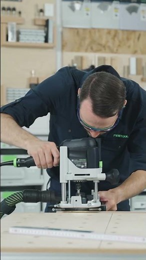 Festool parallel side fence enables parallel working on an edge with OF 1010 R router.