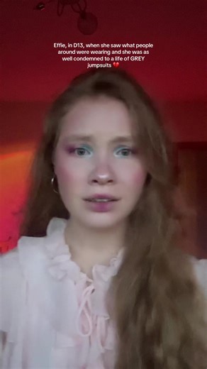 Effie Trinket's Journey Through Grey Jumpsuits