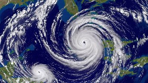 Satellite view of two hurricanes over the ocean | Premium Stock Video Footage