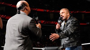 Triple H attacks Paul Heyman during a WrestleMania match contract signing: Raw, March 18, 2013